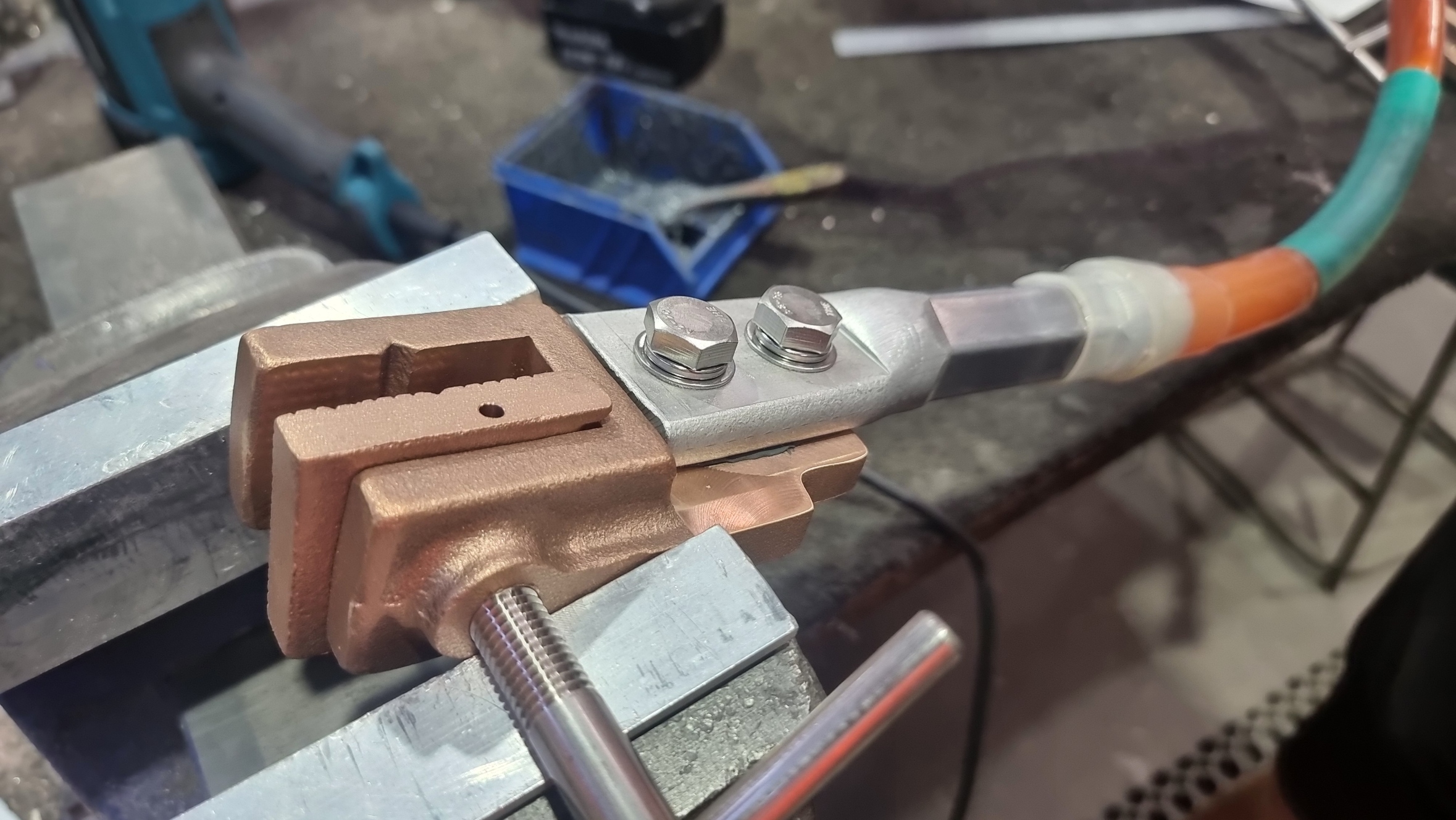 Lugs being attached to a clamp